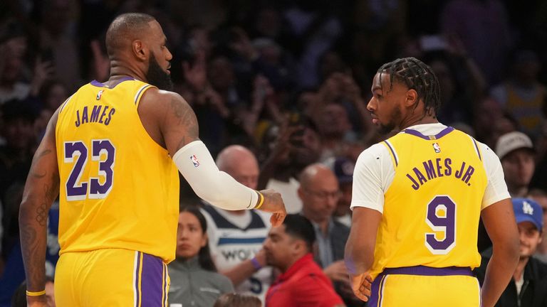 LeBron James and Bronny James featured on court together during the Los Angeles Lakers’ 110-103 victory over the Minnesota Timberwolves; James duo become first father-son pair to play together in NBA history